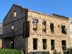 Another shelled out house where there once lived a happy family.